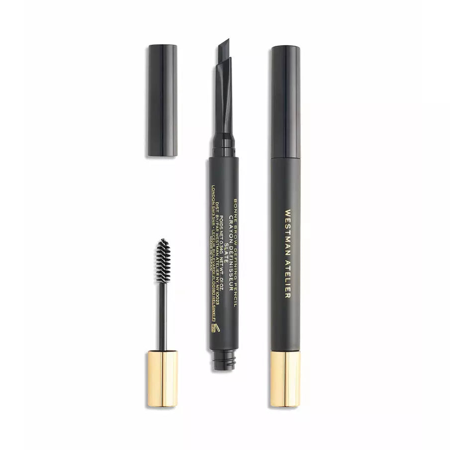 A set of makeup products including mascara, eyeliner, and brow pencil against a white background.