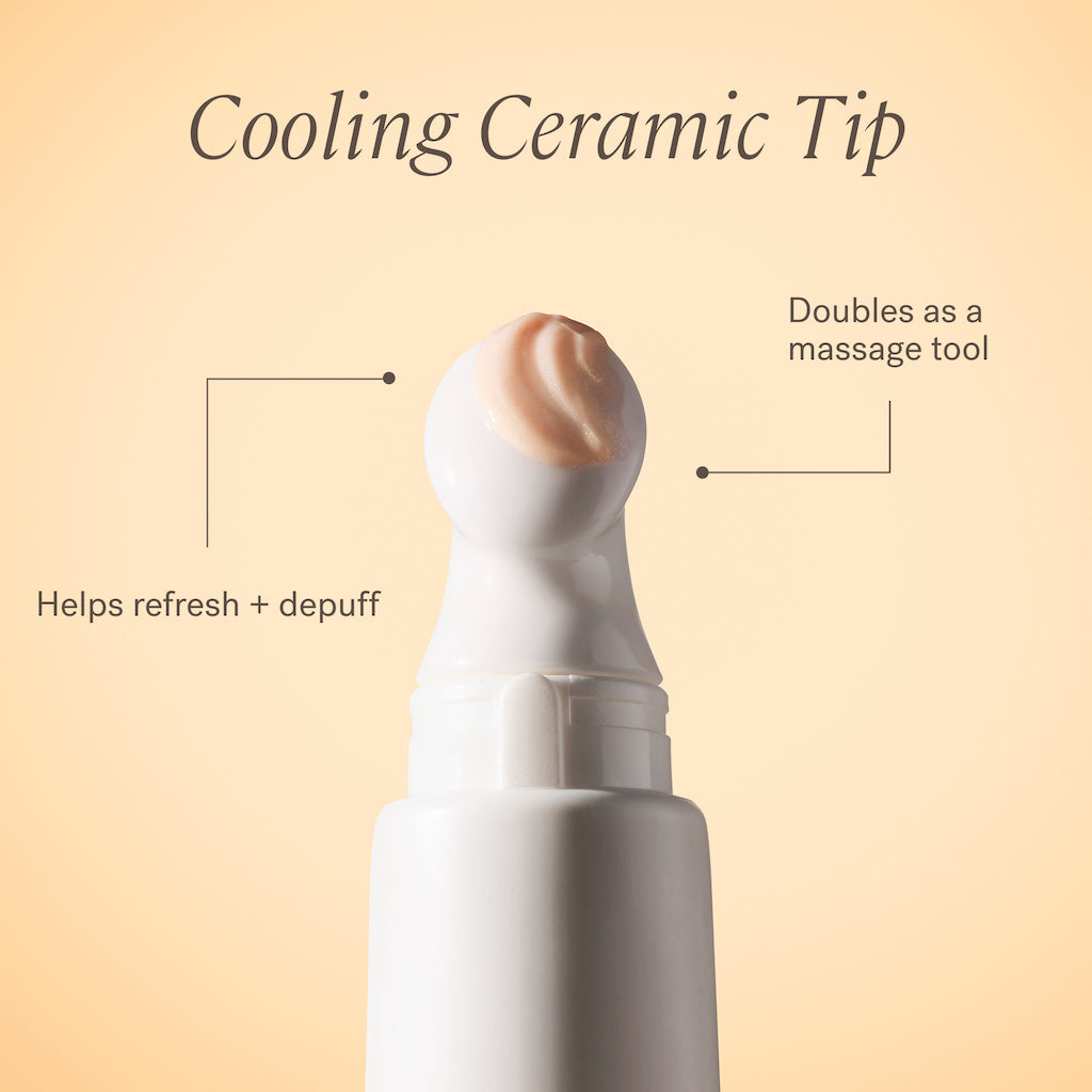 Close-up of a skincare product with a ceramic applicator tip, highlighting its cooling and massaging features.