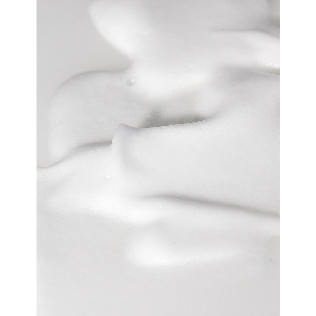 Close-up of white foam with soft peaks and textures.