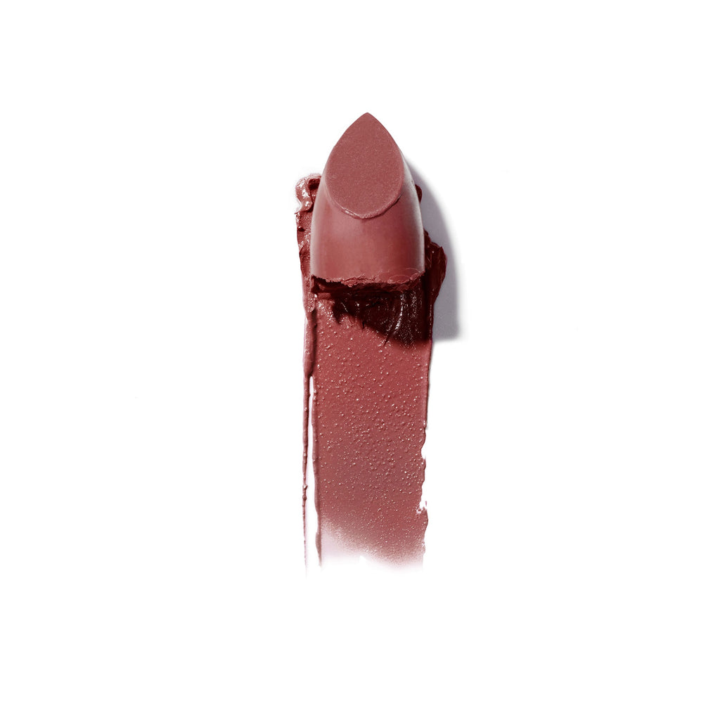 A smeared lipstick showing both the bullet and the color texture.