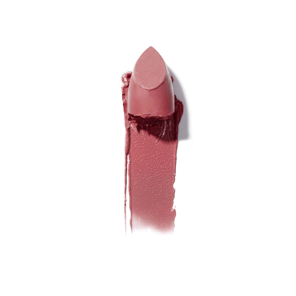 A swatch of rose-colored lipstick with the product beside it.