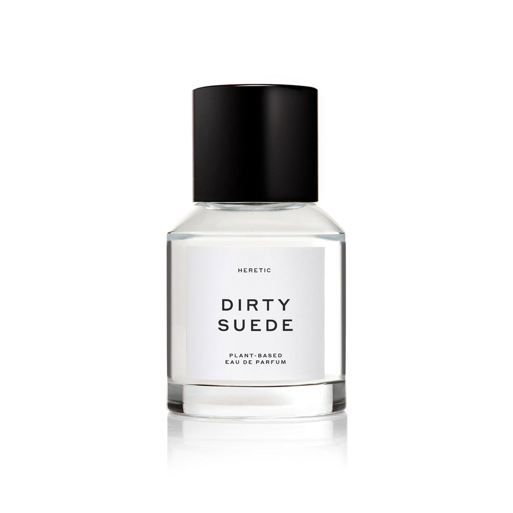 Bottle of heretic dirty suede plant-based eau de parfum on a white background.
