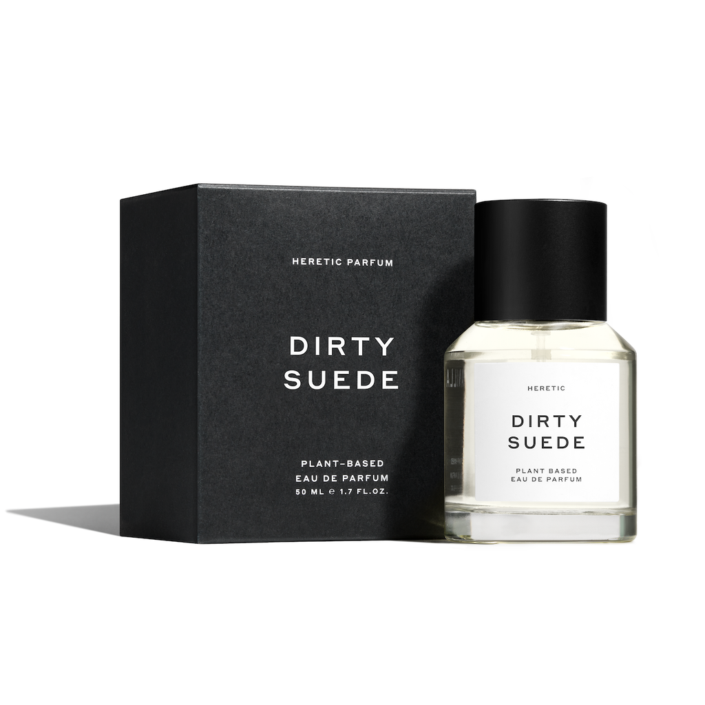 A bottle of heretic parfum dirty suede eau de parfum next to its packaging box.