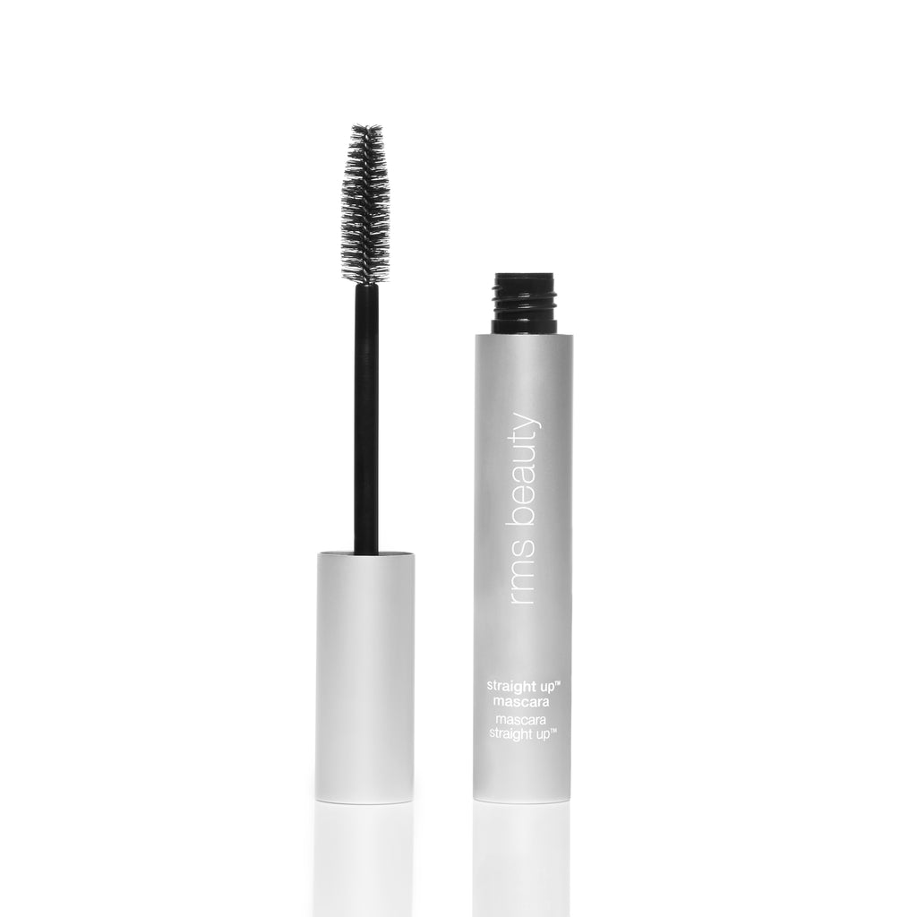 Open mascara tube with applicator brush displayed against a white background.