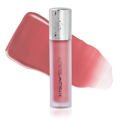 Tube of pink lip gloss with a swatch of color against a white background.