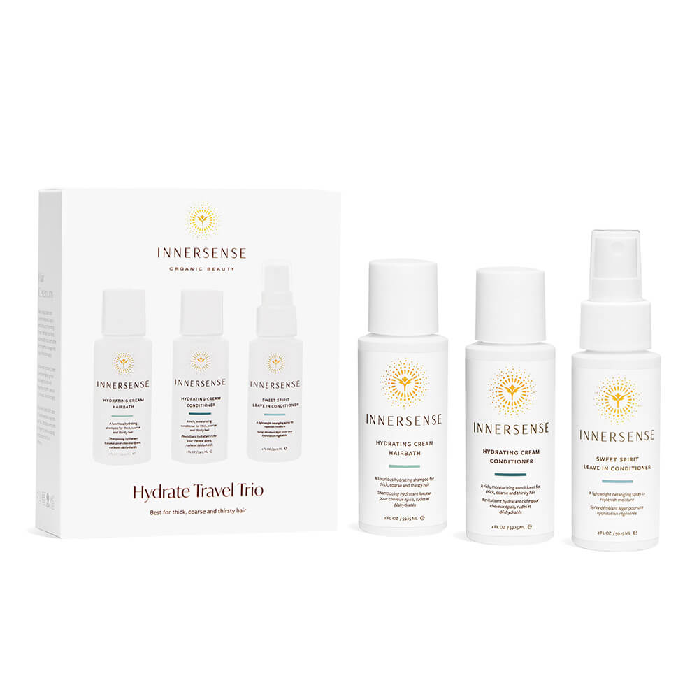 A set of innersense hydrate travel trio hair care products, including shampoo, conditioner, and leave-in conditioner.