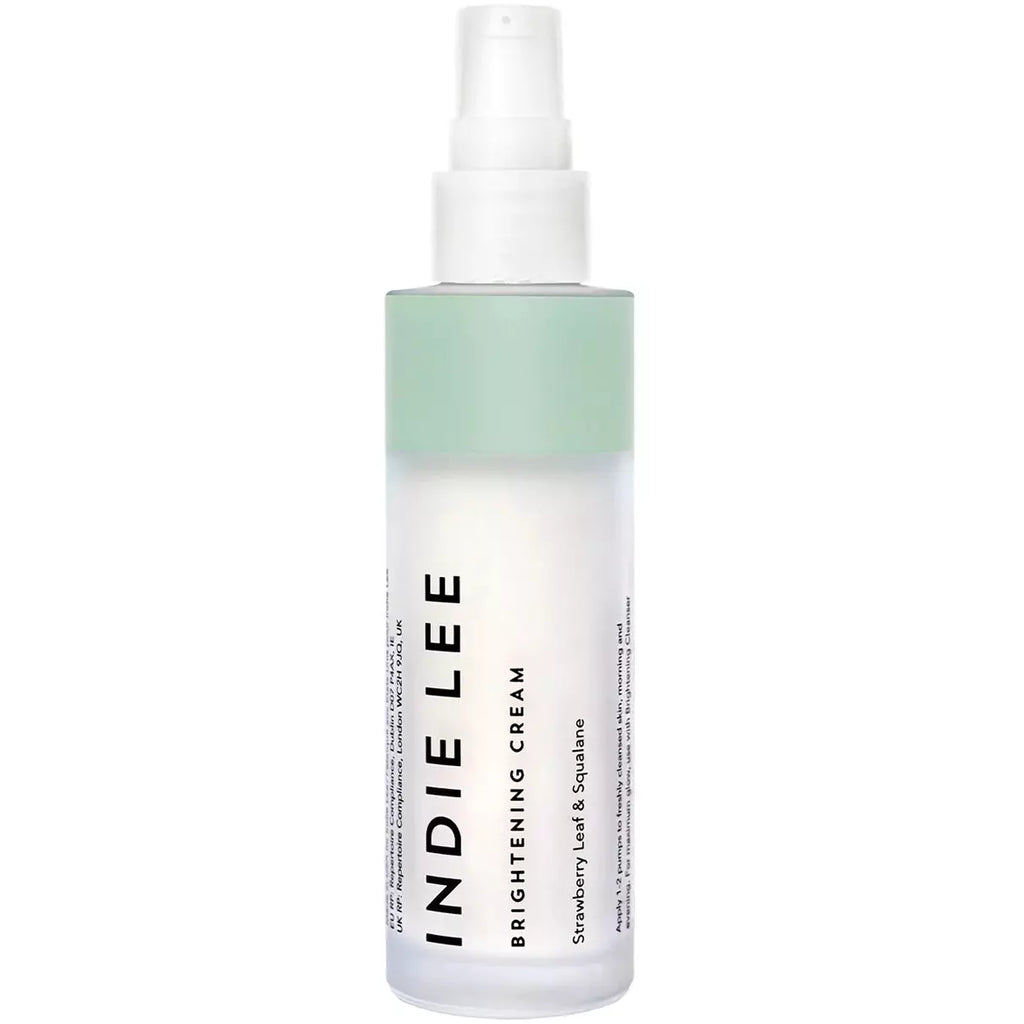 A bottle of indie lee brightening cleanser on a white background.