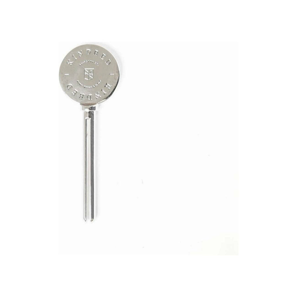 A silver tuning fork on a white background.
