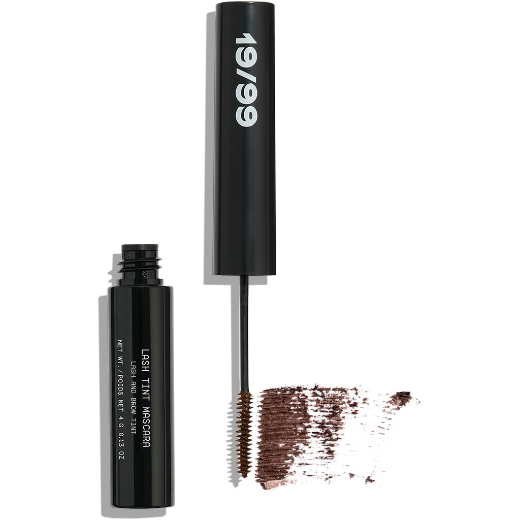 Black mascara tube with wand and brown mascara swatch.