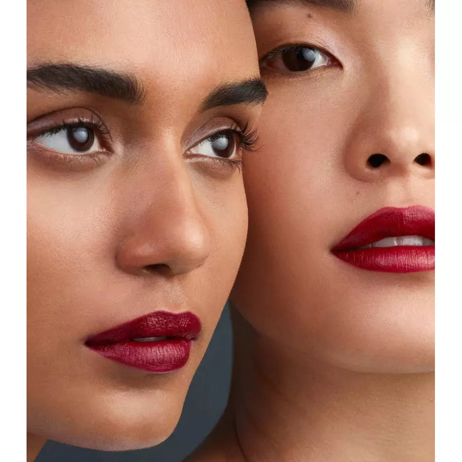 Two women showcasing bold lipstick colors.