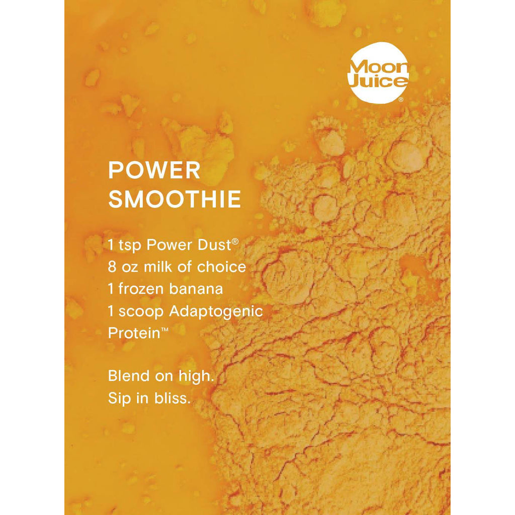 Promotional image for a power smoothie recipe by moon juice, featuring ingredients with the brand's power dustÂ® powder.