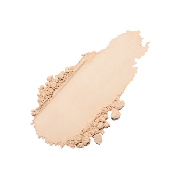 A smear of light beige powder makeup isolated on a white background.