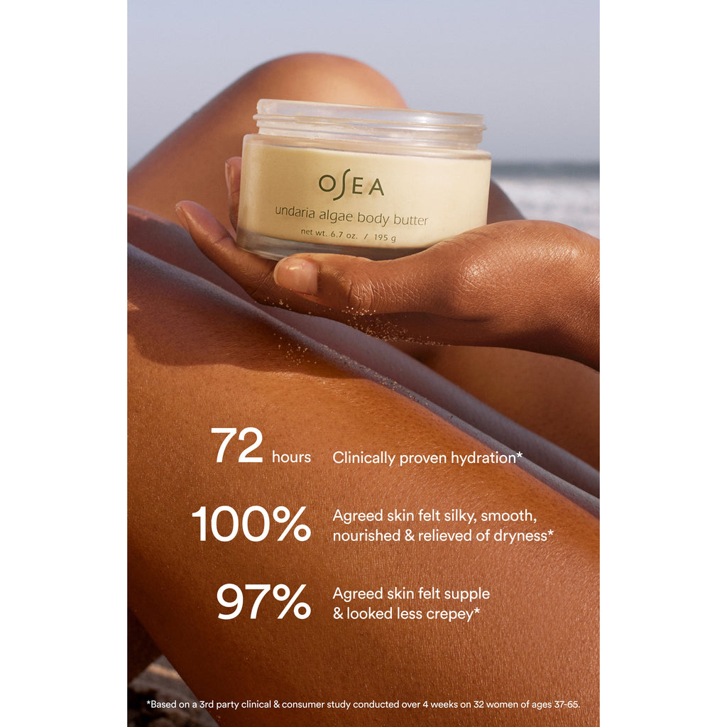 A person holding a jar of osea body cream, highlighting the product's benefits for skin hydration and nourishment.
