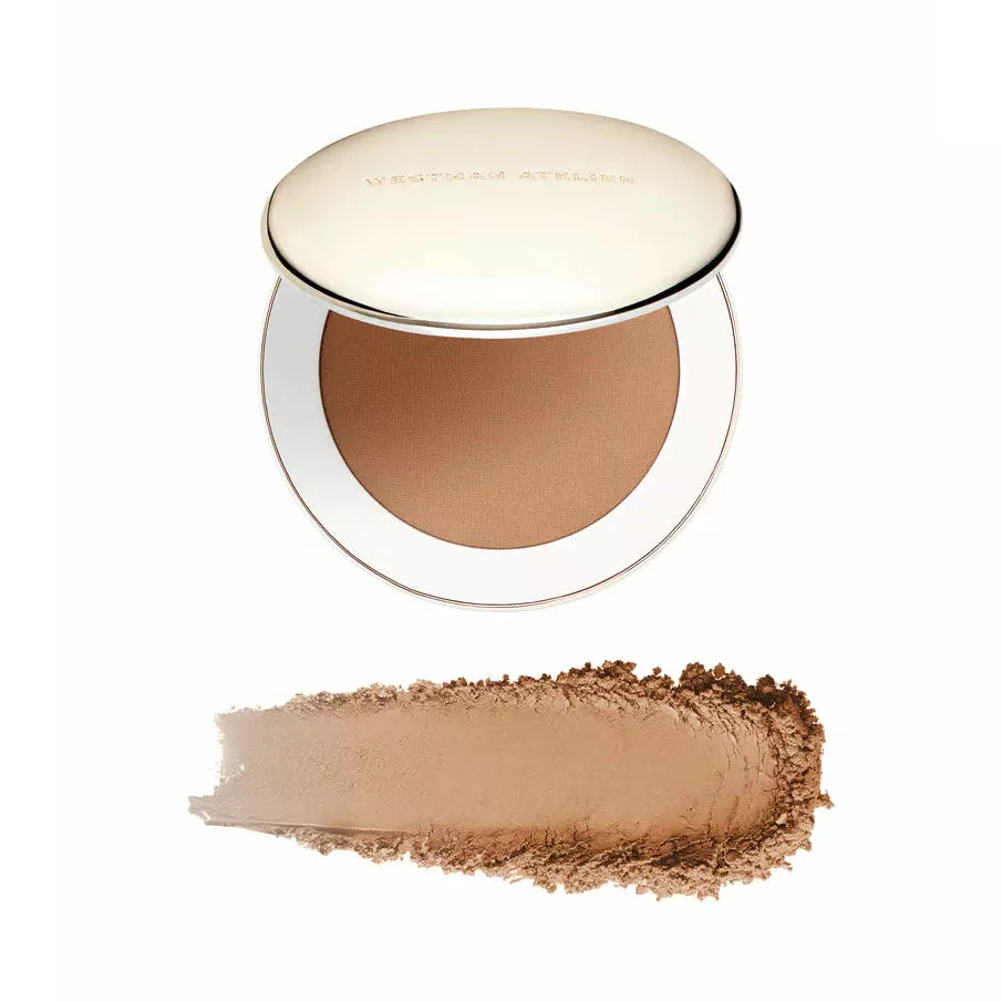 Compact face powder with a swatch of its shade below.