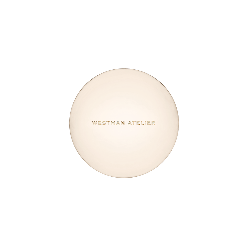 A glowing spherical object with the text "westman atelier" on it against a black background.