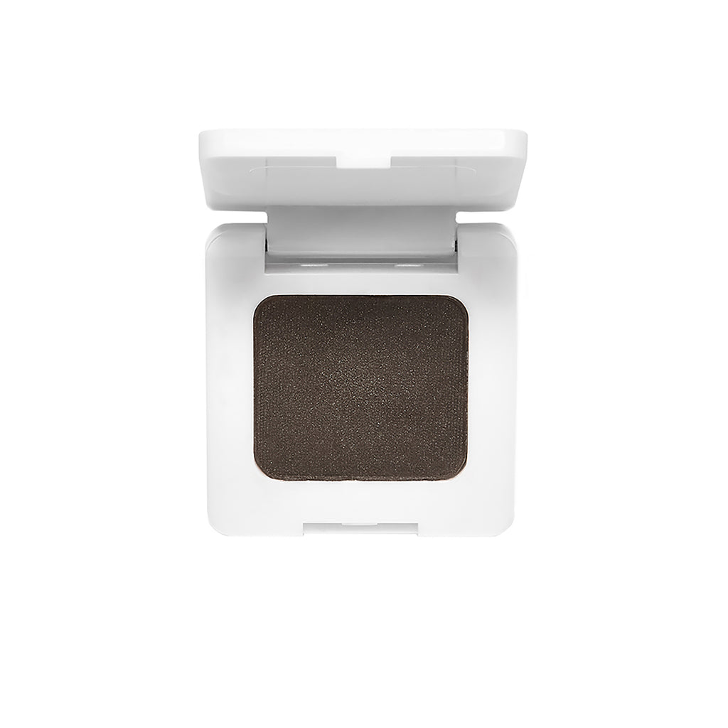 Single eyeshadow compact with dark shade against a white background.