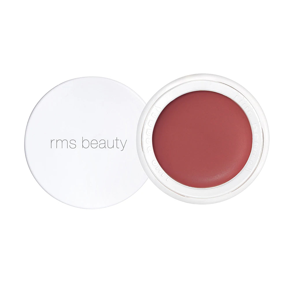 Open container of rms beauty lip and cheek product against a white background.