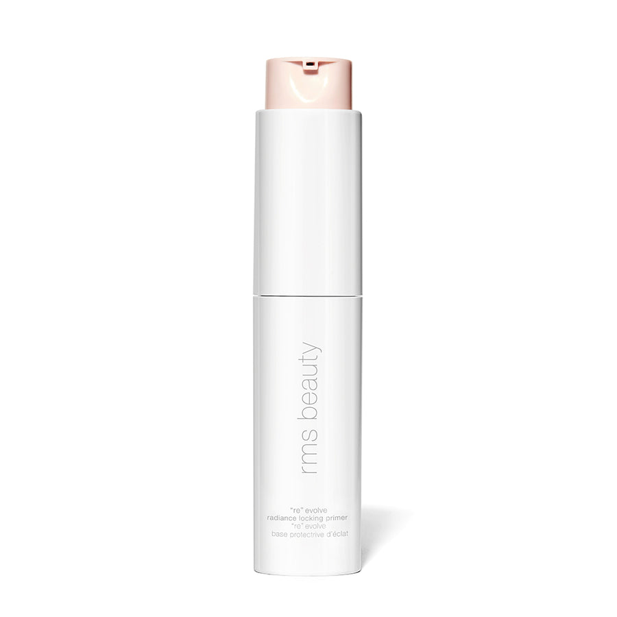 Rms beauty face primer in a white cylindrical packaging with a rose gold cap.