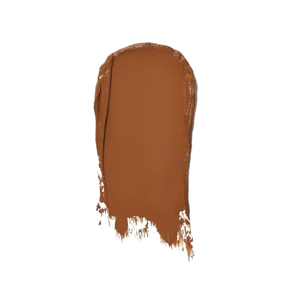 A swatch of brown liquid foundation makeup.