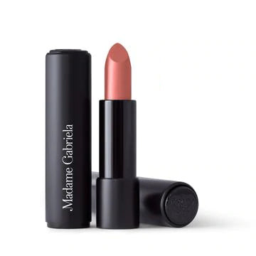 Tube of lipstick with cap removed, showcasing a soft rose shade.