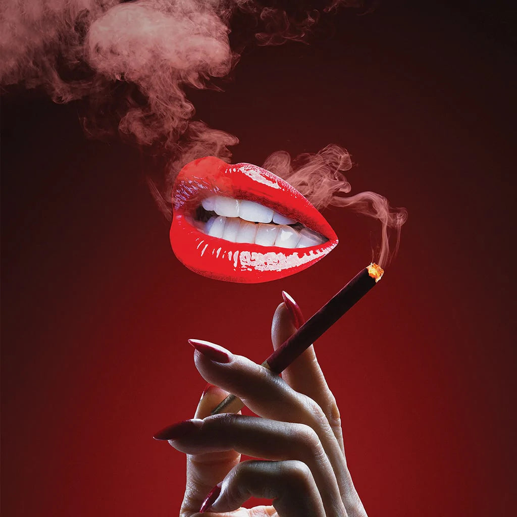 Red lips exhaling smoke with a hand holding a lit cigarette against a red background.