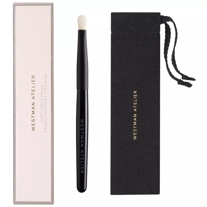 Makeup brush with protective case and storage pouch by westman atelier.