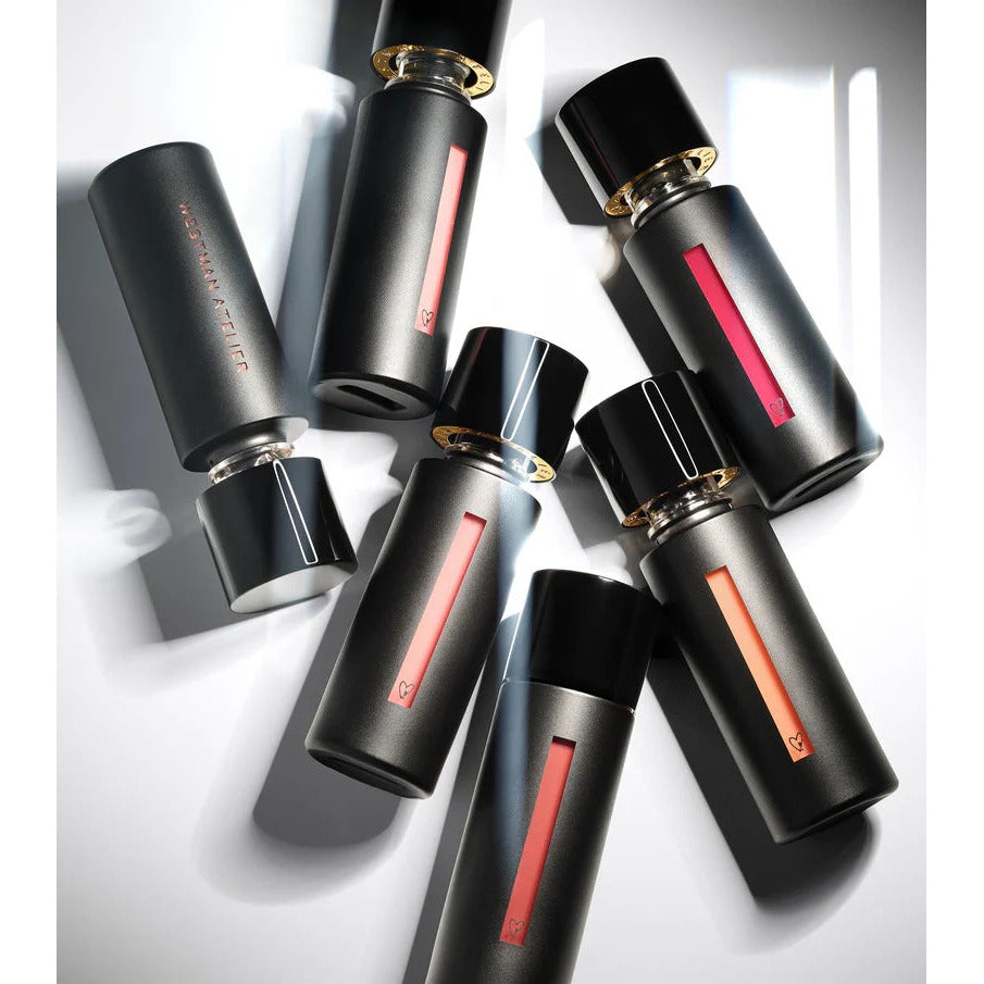 Collection of luxury lipsticks with visible color indicators.