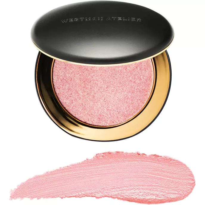 A pink blush cosmetic product by westman atelier with an open container view at the top and a swatch of the product below.