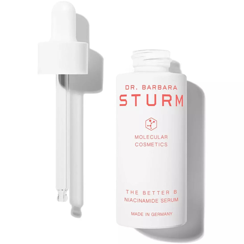 A bottle of dr. barbara sturm molecular cosmetics 'the better b' niacinamide serum with its dropper.