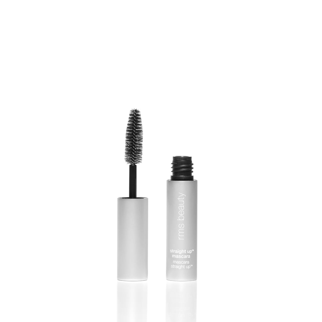 An open mascara tube with the wand and brush displayed against a white background.