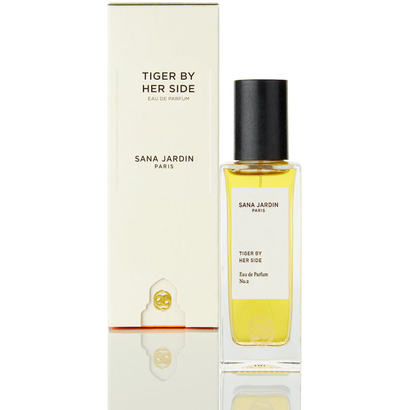 Bottle of "tiger by her side" eau de parfum from sana jardin paris with packaging.