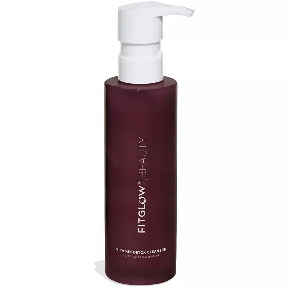 A bottle of fitglow beauty vitamin detox cleanser with a pump dispenser.