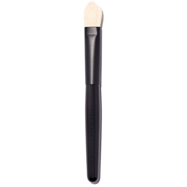A single makeup brush with a black handle on a white background.