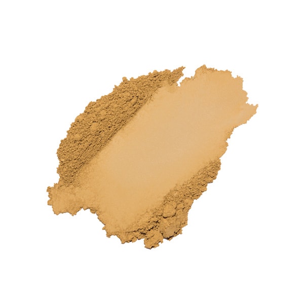 A swatch of beige powder makeup foundation on a plain background.