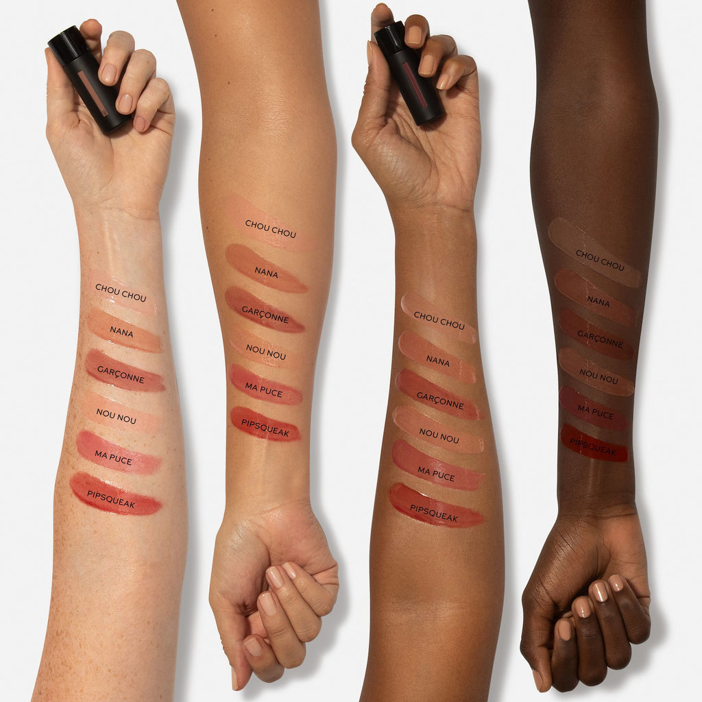 A range of lipstick shades swatched on arms of various skin tones.