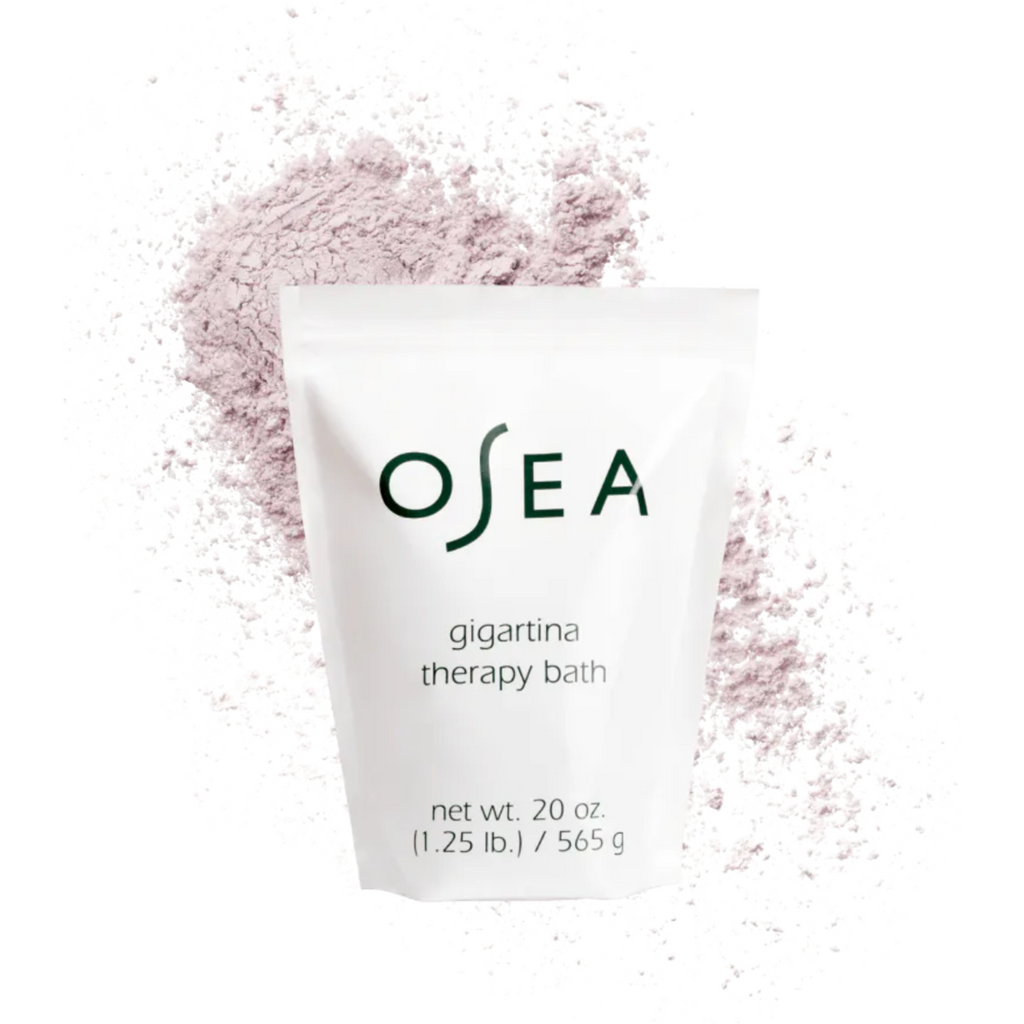 A package of osea gigartina therapy bath powder displayed with some of the product scattered around it.