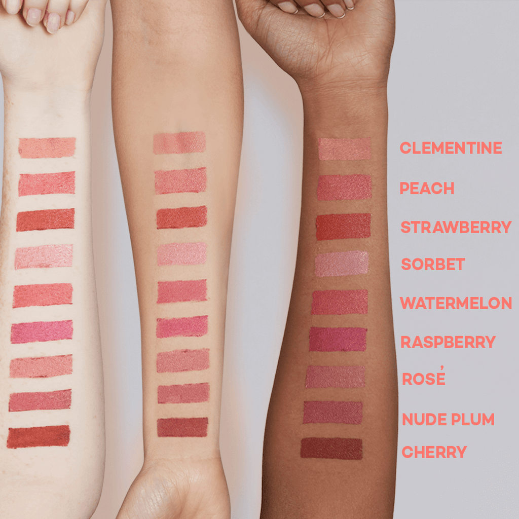 Swatches of various shades of lipstick on three different skin tones.