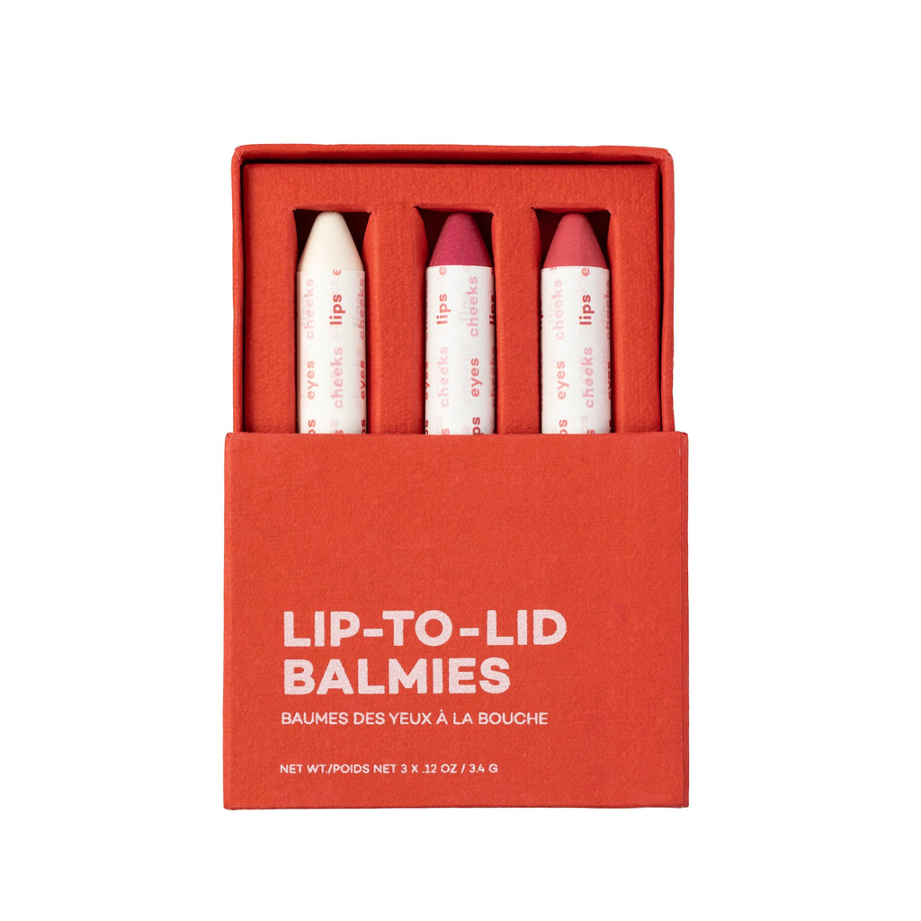 A set of three lip balms in a red box with "lip-to-lid balmies" text displayed on the cover.