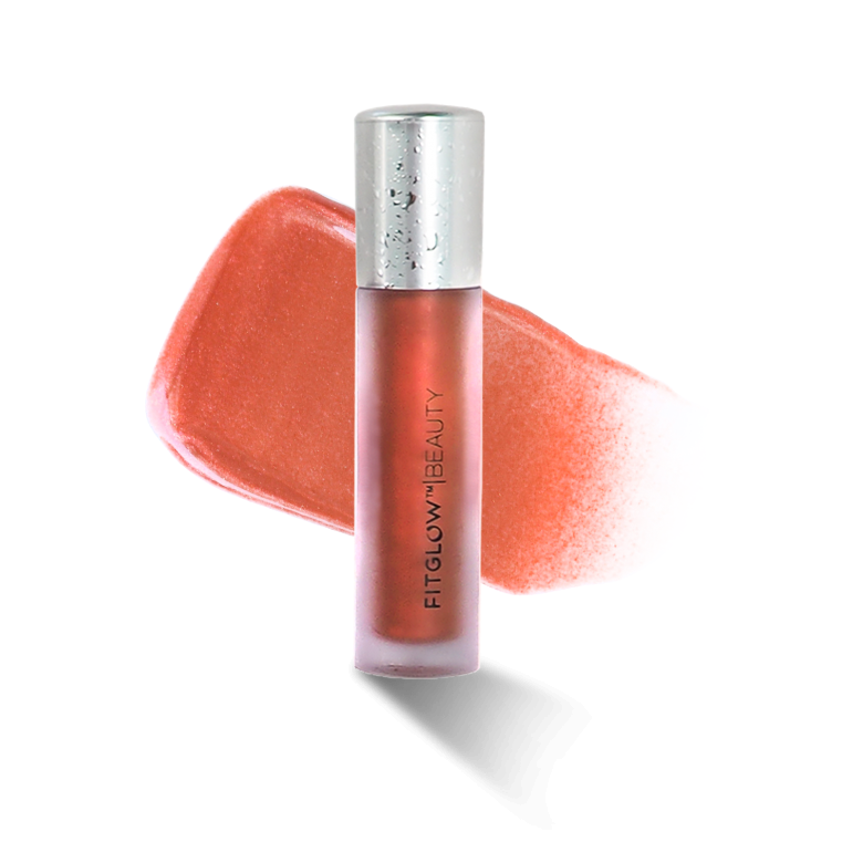 Lip gloss tube with orange swatch on a white background.