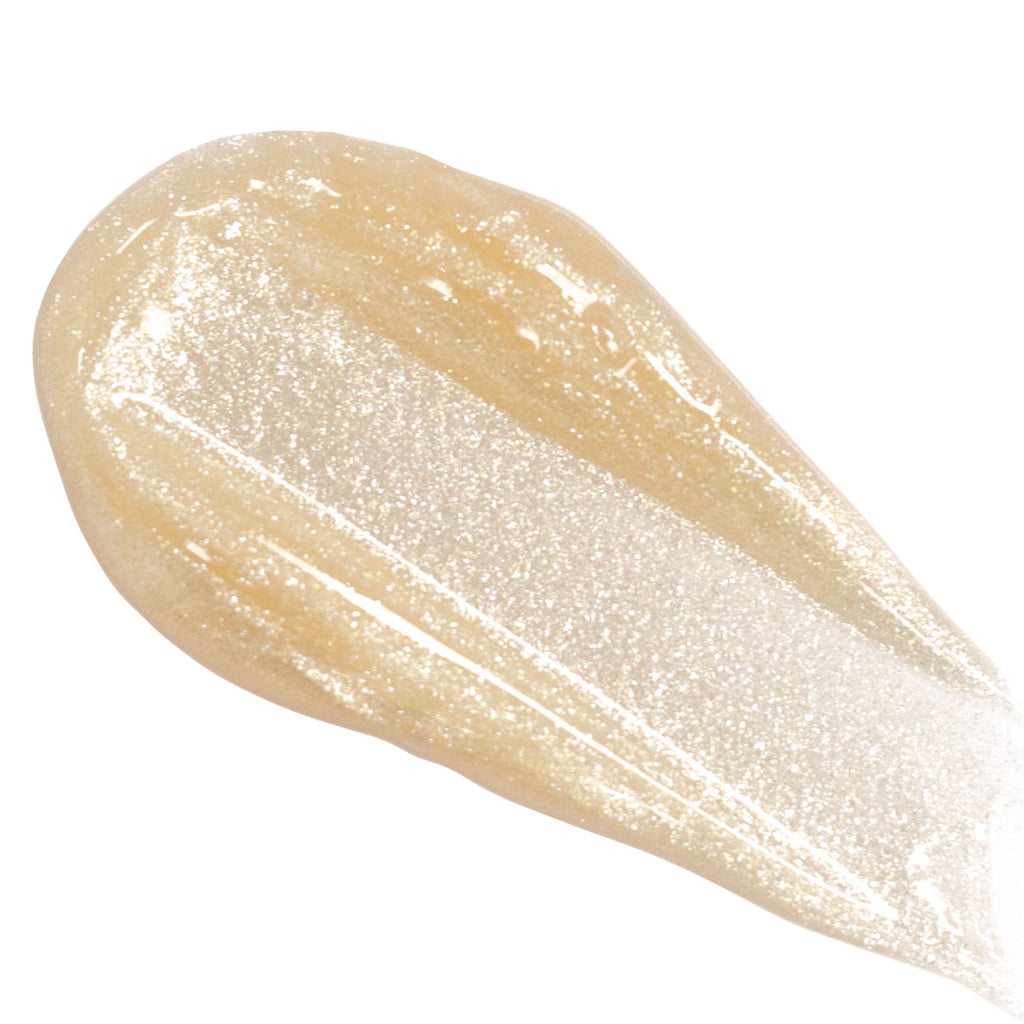 A smear of translucent cosmetic gel with glitter particles on a white background.