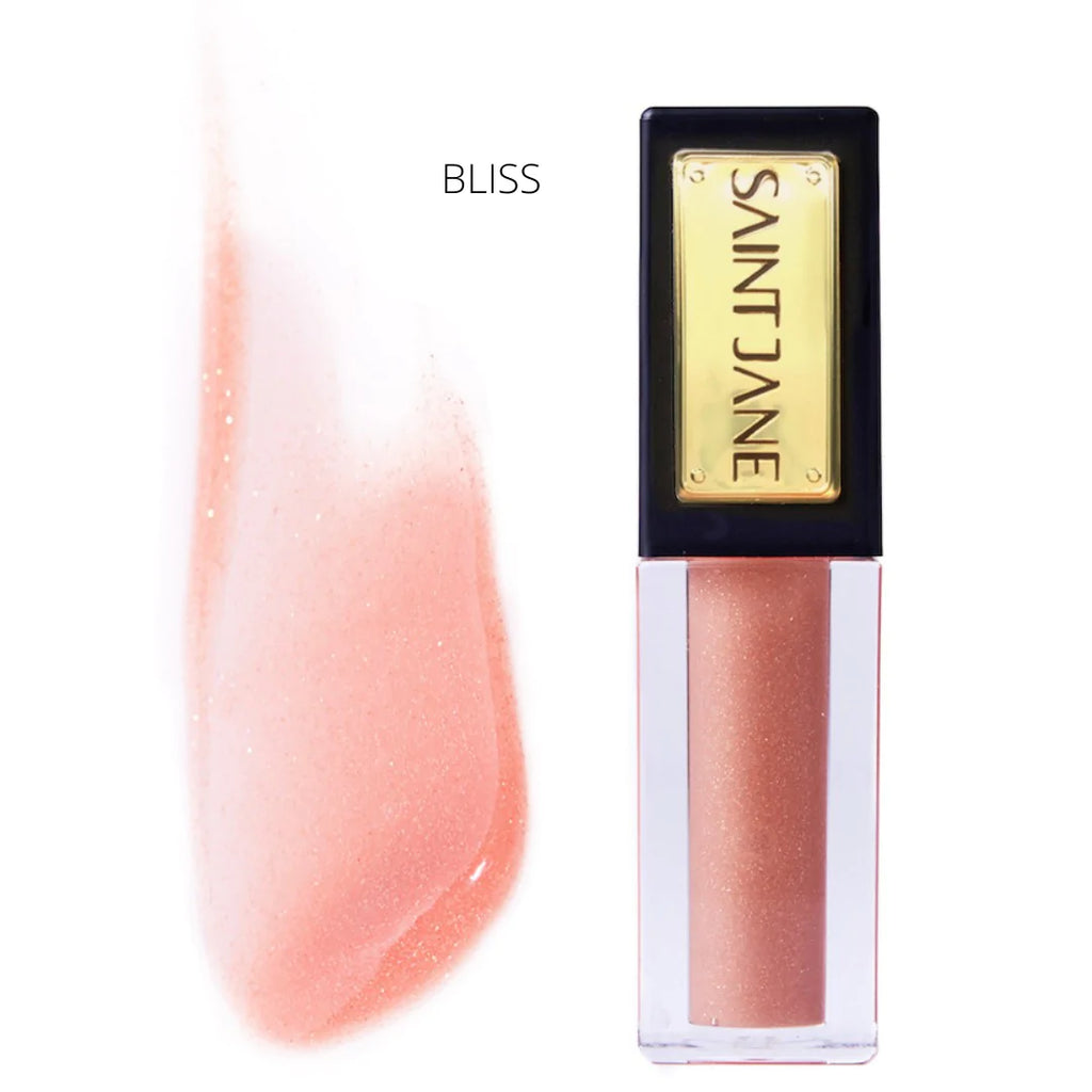 A swatch of shimmery pink lip gloss next to its corresponding product packaging labeled "bliss.
