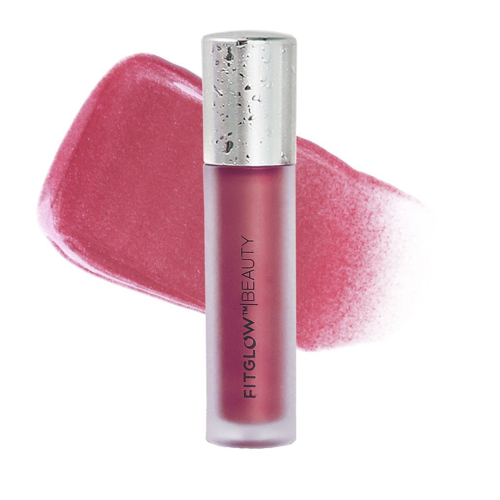 A tube of lip gloss with a pink shade swatch beside it.