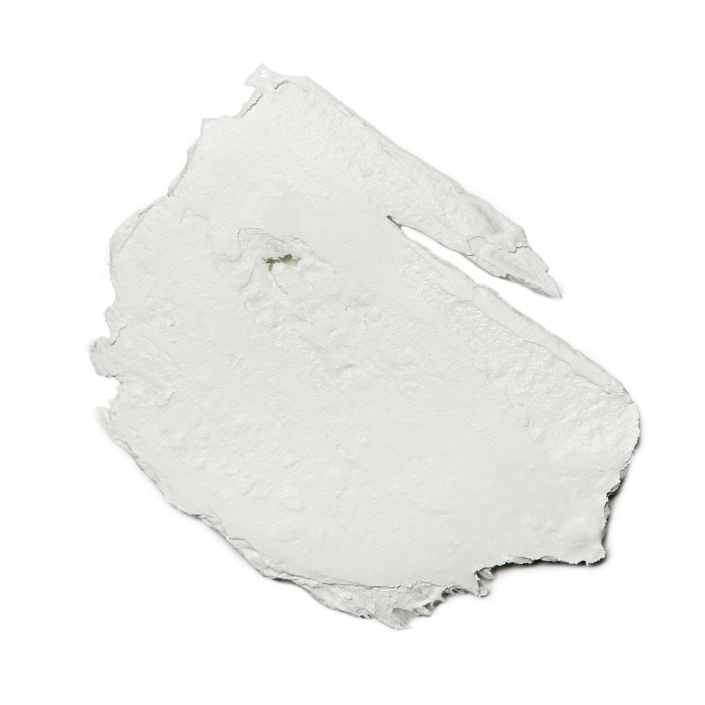 A swatch of white paint with rough edges isolated on a white background.