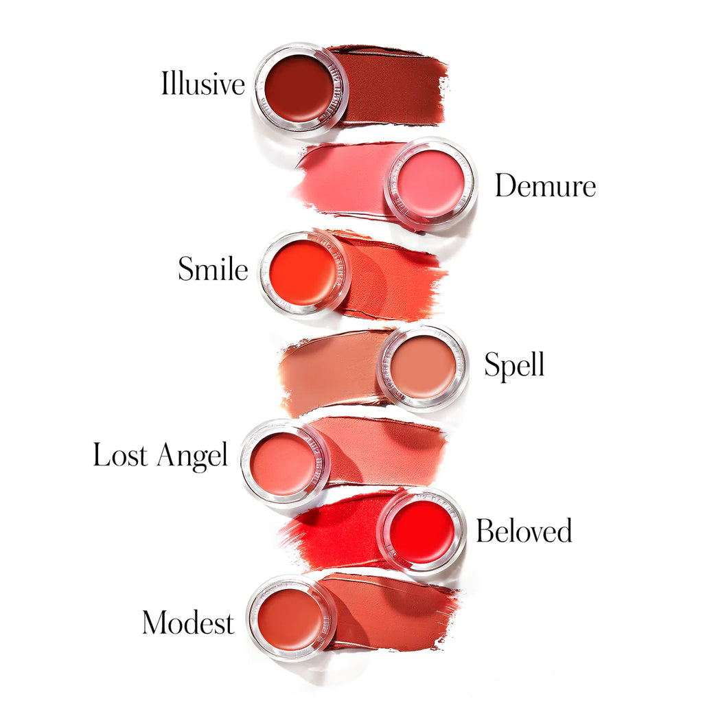 A collection of lipstick swatches in various shades with corresponding names like illusive, demure, smile, spell, lost angel, beloved, and modest.
