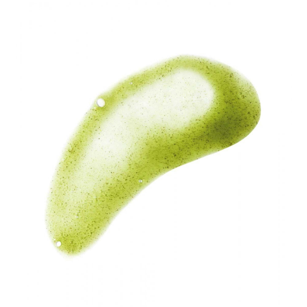 A smear of green, glittery substance on a white background.