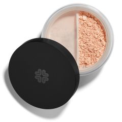 Open container of loose powder cosmetic with a black lid next to it.