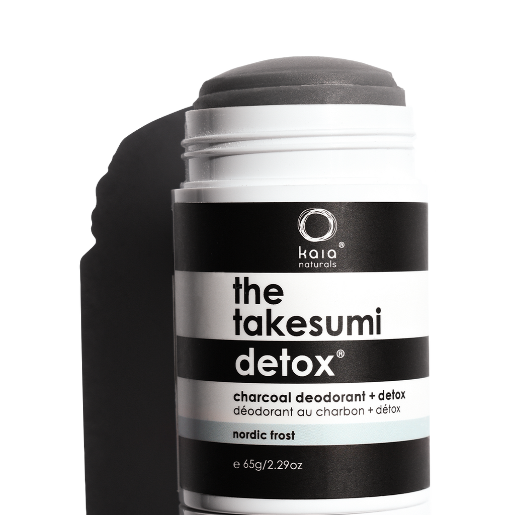 A container of kaia naturals "the takesumi detox" charcoal deodorant in nordic frost scent.
