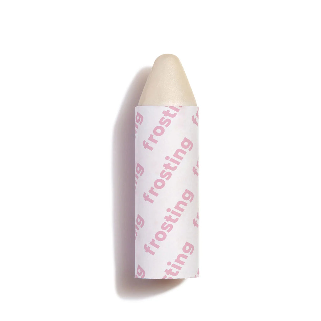 Lip balm with frosting flavor label on a white background.