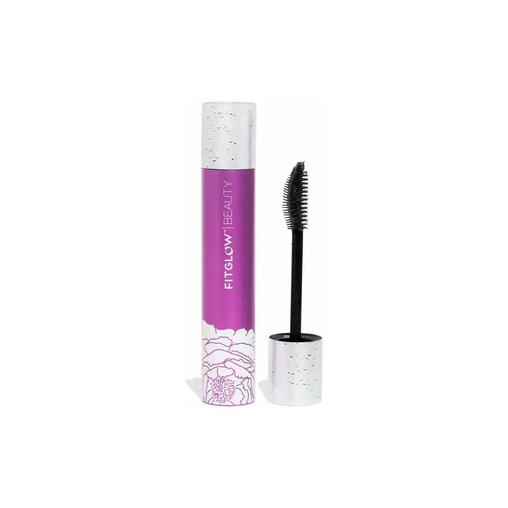 Mascara tube with brush applicator on white background.