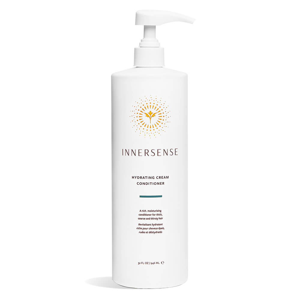 A bottle of innersense hydrating cream conditioner with a pump dispenser.